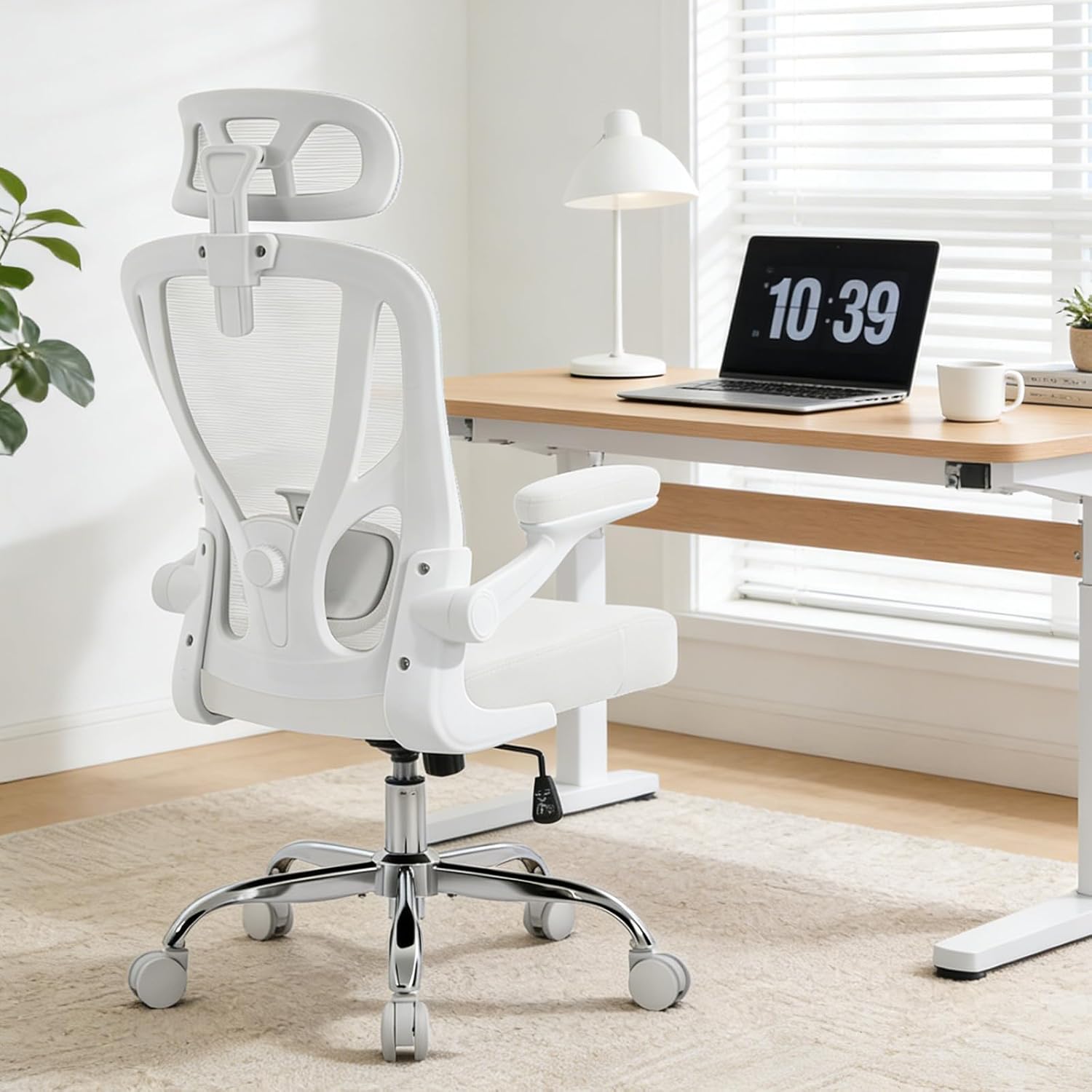 White ergonomic office chair with headrest and flip-up armrests